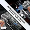 A hand-held vacuum cleaner is shown being used to clean a keyboard and a car's interior. Produktbild-Vorschau