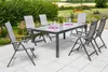 An outdoor patio setting with a dining table and chairs. Produktbild-Vorschau