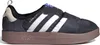 A side view of a black Adidas Puffylette sneaker with white stripes and a brown sole. Podgląd zdjęcia produktu