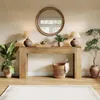 A console table with decorative items and plants in a room. Podgląd zdjęcia produktu