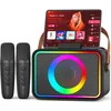 A karaoke machine with two microphones and a tablet displaying music. Produktbild-Vorschau