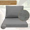 A close-up of a grey cushion set, with a magnified view of embroidered text. Produktbild-Vorschau