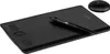 A black Wacom Intuos Pro digital drawing tablet with a stylus and a circular stand, photographed on a white background. Produktbild-Vorschau