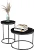 Two round nesting tables with black marble tops and gray metal legs, one table has a vase with dried flowers and the other has a stack of books. Náhľad obrázku produktu