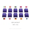 A collection of keyboard keycaps with different country flags and characters printed on them, arranged in a grid. Produktbild-Vorschau