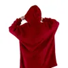 Back view of a person wearing a red hooded blanket. Produktbild-Vorschau