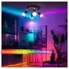 A modern kitchen or living area illuminated by colorful LED lights, showcasing a ceiling light fixture. Produktbild-Vorschau
