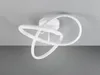 A white LED ceiling light with a modern, abstract design is mounted on a white ceiling against a gray background. Podgląd zdjęcia produktu