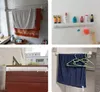 Collage of four bathroom and outdoor scenes featuring towels and drying racks. Produktbild-Vorschau