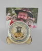 A product shot of Reuzel Beard Balm with a promotional image of a man with a beard in the background. Náhled obrázku produktu