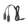 A black USB power cable with two USB-A connectors and one DC barrel connector, laid out on a white background. Náhled obrázku produktu