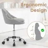 A grey ergonomic office chair with a chrome base and wheels, shown in a room with a blurred background. Text overlays highlight 'Ergonomic Design' and an illustration shows proper posture. Produktbild-Vorschau