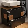 A bathroom vanity with a sink and open drawers. Anteprima dell’immagine prodotto