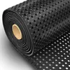 A rolled-up black rubber mat with a hole pattern, on a white background. Podgląd zdjęcia produktu