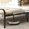 A low-angle shot of a bed frame with a robot vacuum cleaner underneath, highlighting the space beneath the bed. Text overlays describe the benefits of the space. Voir les images du produit