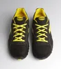 A pair of black and yellow work shoes are shown from a top-down perspective against a white background. Náhľad obrázku produktu