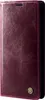 A close-up, studio shot of a burgundy leather flip phone case. Produktbild-Vorschau