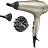 A gold and black hair dryer with two attachments, a concentrator nozzle and a diffuser, displayed against a white background. Náhled obrázku produktu