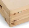 A close-up view of the corner of a wooden storage box, showing the grain of the wood and a metal hinge. Anteprima dell’immagine prodotto