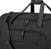 A close-up view of a black duffel bag, focusing on the zippers and straps. Podgląd zdjęcia produktu