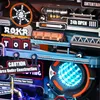 A close-up view of a complex 3D puzzle with various signs and mechanical elements. Produktbild-Vorschau