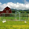 A red barn and a green landscape with a chicken coop in the foreground. Náhled obrázku produktu
