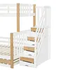 A close-up view of the stairs and drawers of a white bunk bed with wooden accents. Anteprima dell’immagine prodotto