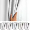 A hand is shown parting white blackout curtains, with a series of smaller images below demonstrating how the color perception of the curtains changes under different lighting conditions. Produktbild-Vorschau