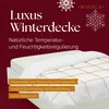 A close-up view of a white winter duvet with a grid pattern, placed on a bed. The background is a dark red color with snowflake graphics and a brand logo. Podgląd zdjęcia produktu