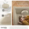 A child sleeping on a modular sofa with descriptive text and icons. Náhled obrázku produktu