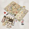 A board game laid out on a textured surface. Náhľad obrázku produktu
