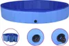 A blue foldable dog pool shown from a slightly elevated angle, with close-up insets showing the folded state and the drain valve. Anteprima dell’immagine prodotto