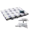 A folded vacuum storage bag with a lavender pattern and a valve, shown against a white background. Inset images show the bag being compressed. Náhľad obrázku produktu