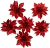 Six red glitter poinsettia flowers arranged in a circular pattern on a white background. Produktbild-Vorschau