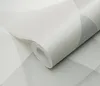 A roll of wallpaper with a geometric pattern. Produktbild-Vorschau