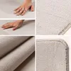 A collage of close-up images showing the texture and edges of a beige rug. Produktbild-Vorschau