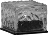 A single ice cube shaped LED candle on a black base. Podgląd zdjęcia produktu