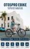 A woman rides an e-bike on a street in front of a building. Produktbild-Vorschau