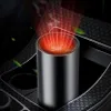 A car heater is placed in a car's cup holder, with red heat waves emanating from the top. Anteprima dell’immagine prodotto