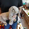 Maman lapin avec bébés Doudou Noxxiez Lapin en peluche Voir les images du produit 3