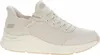 A side view of a beige Skechers slip-on sneaker. Produktbild-Vorschau