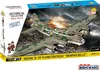 The image shows the packaging of a COBI Boeing B-17F Flying Fortress "Memphis Belle" model kit. The box features a dramatic illustration of the bomber in flight against a stormy sky, with smaller images of the model and figures on the side. Voir les images du produit