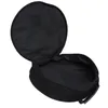 An open black circular bag with a handle on the side, shown against a white background. Podgląd zdjęcia produktu