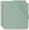 Two folded green fitted sheets are shown from a top-down perspective. Produktbild-Vorschau