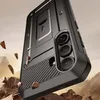 A rugged phone case is shown in a dynamic, action-oriented scene with rocks flying around it, suggesting durability and protection. Náhled obrázku produktu