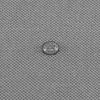 A close-up of a gray fabric with a water droplet on it. Anteprima dell’immagine prodotto