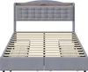 A bed frame with a headboard and a slatted mattress support system. Produktbild-Vorschau