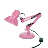 A pink desk lamp with an adjustable arm and base, photographed against a white background. Anteprima dell’immagine prodotto