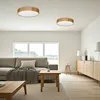 A modern living room with a sofa, coffee table, and a sideboard. Produktbild-Vorschau