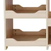 A close-up view of two shelves of a wooden wardrobe. Anteprima dell’immagine prodotto